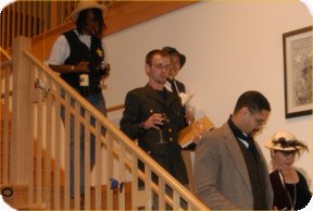 Murder Mystery Players on Staircase